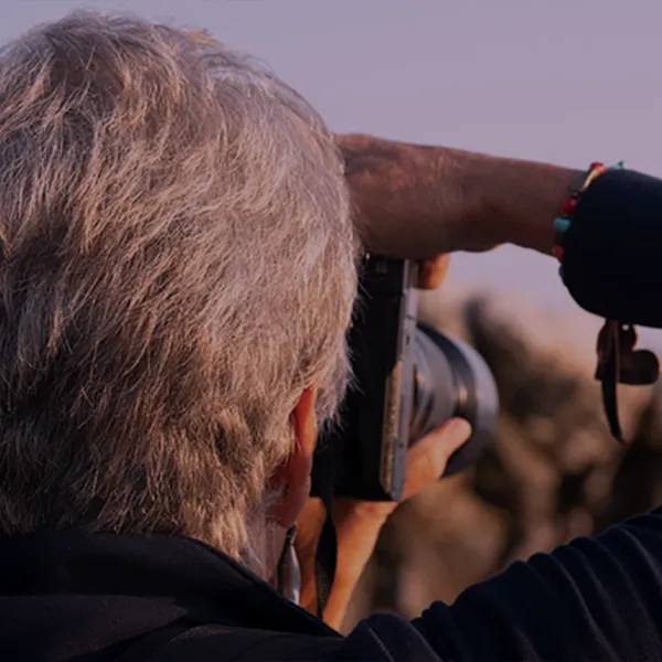 Photographer from behind taking a photo